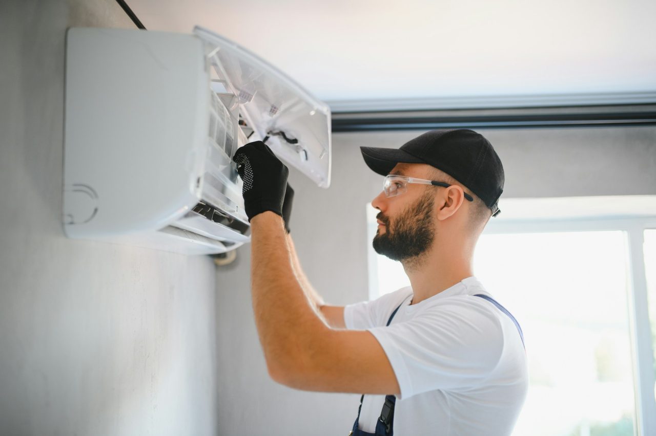 male technicians service for repair and maintenance of air conditioners 1